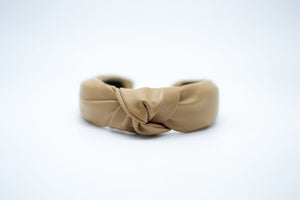 
                
                    Load image into Gallery viewer, Faux Leather Knotted Headband
                
            